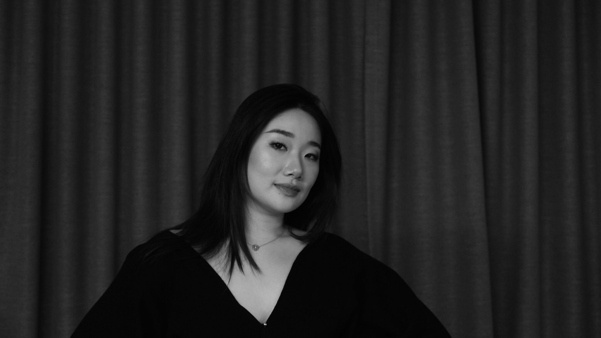 A black and white photo of Angela Chen
