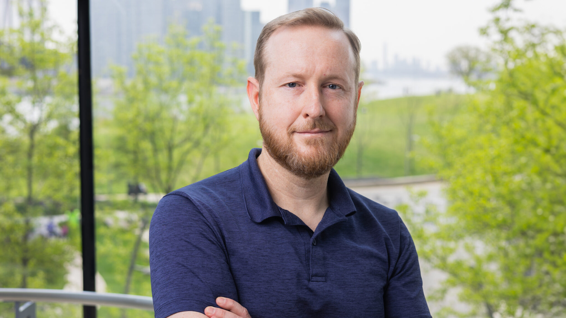 A color photo of a man with a beard.