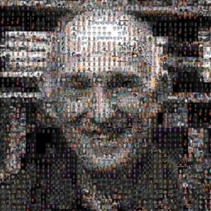 Pixelated photo of Don Greenberg (man smiling at camera in front of bookshelves)