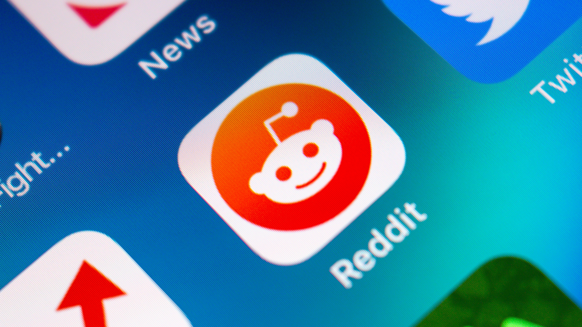 Koshiro K / Shutterstock.com - A screen showing social media icons