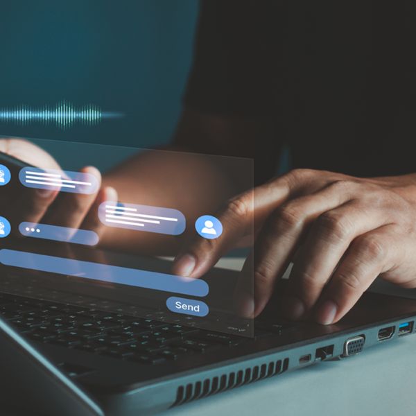 Hands typing on keyboard